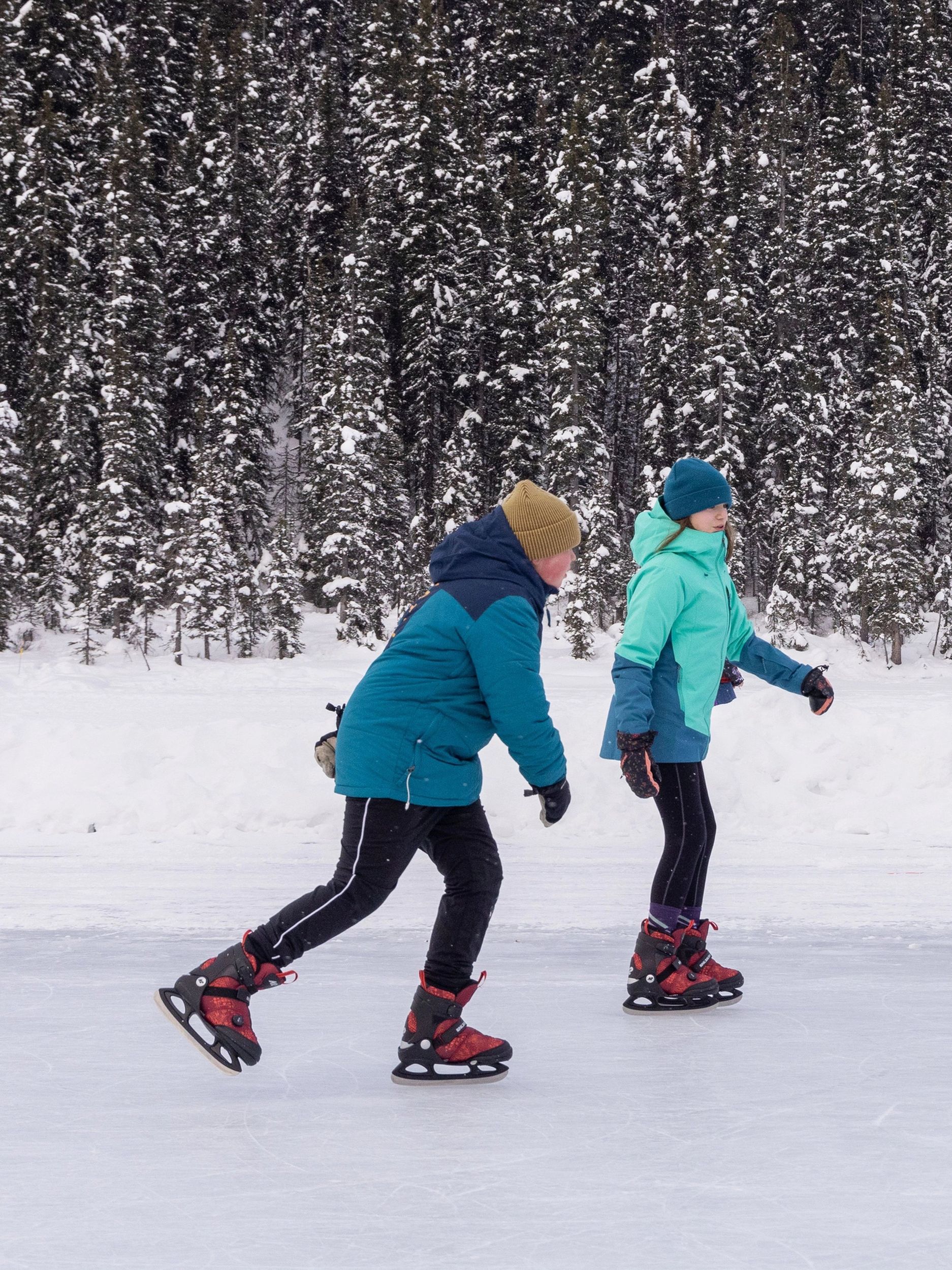 K2 Kids' Rink Raven Boa Water-Repellent Adjustable Ice Skates with Hockey Blades