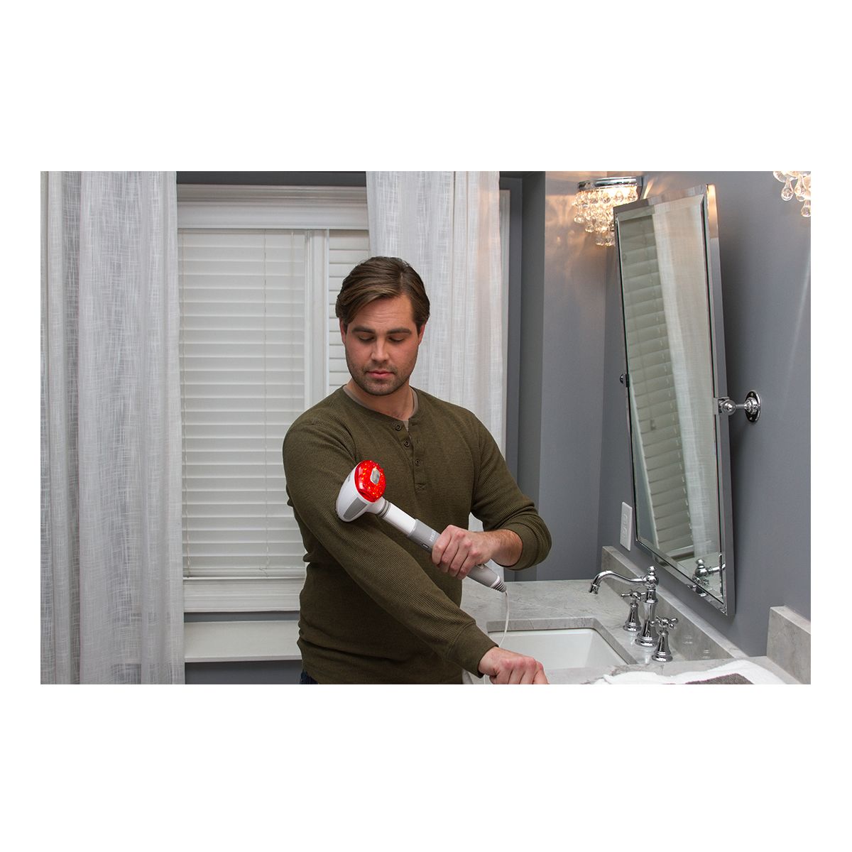 The HoMedics® Travel Handheld Massager With Heat Front_Angled_Left