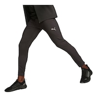 PUMA Men's Run Favorite Tapered Pants Front_Three_Fourths_Angled_Left