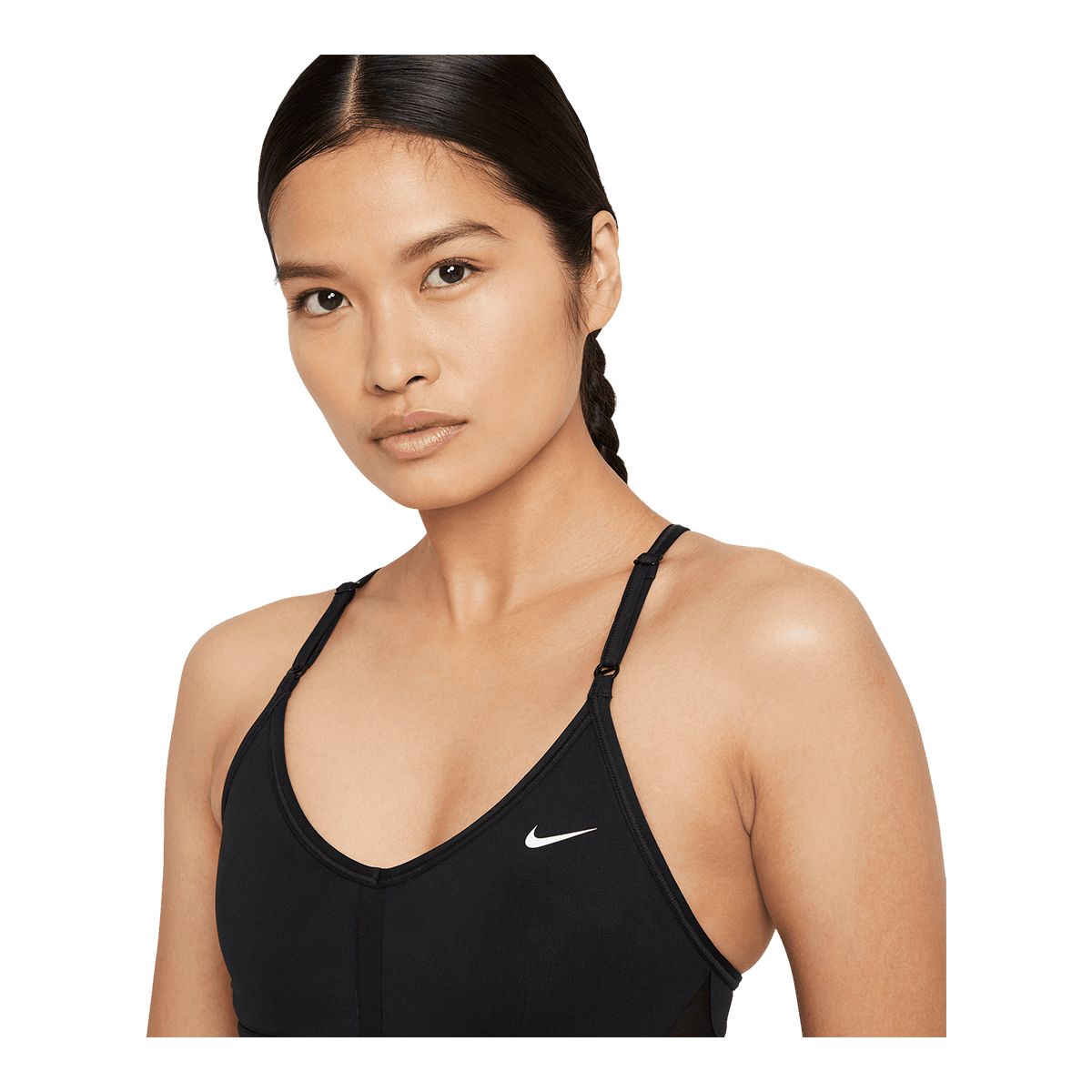 Nike Indy Light-Support Padded V-Neck Sports Bra The Nike Dri-FIT Indy Sports  Bra makes simple support even easier with straps that adjust in the front.  Soft fabric is designed for breathability on