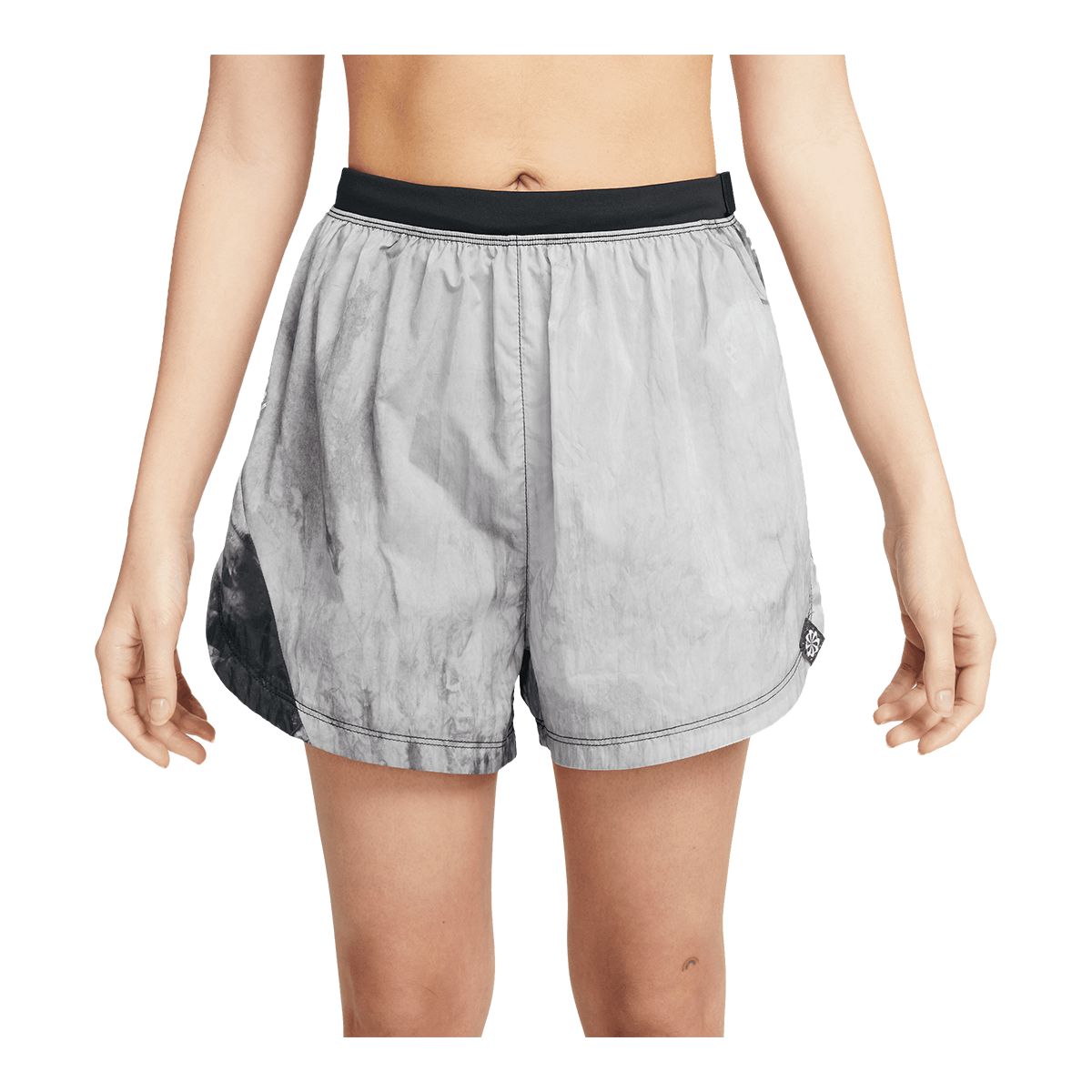 Atmosphere.ca has Nike Women's NK Dri-FIT Trail MR 3 Inch Shorts