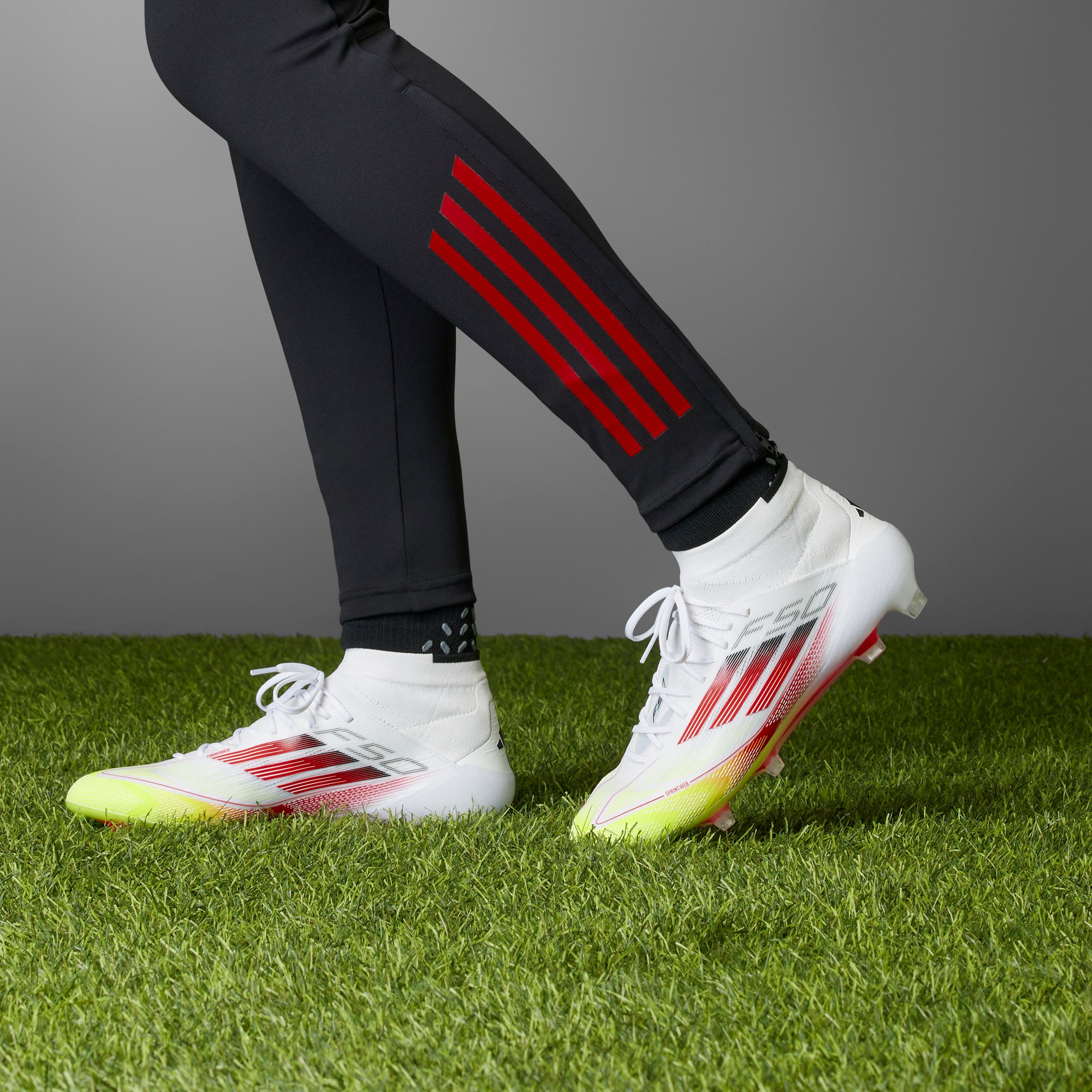 adidas Women's F50 Elite Mid Firm Ground Cleats